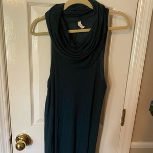 Sleeveless turquoise sweater